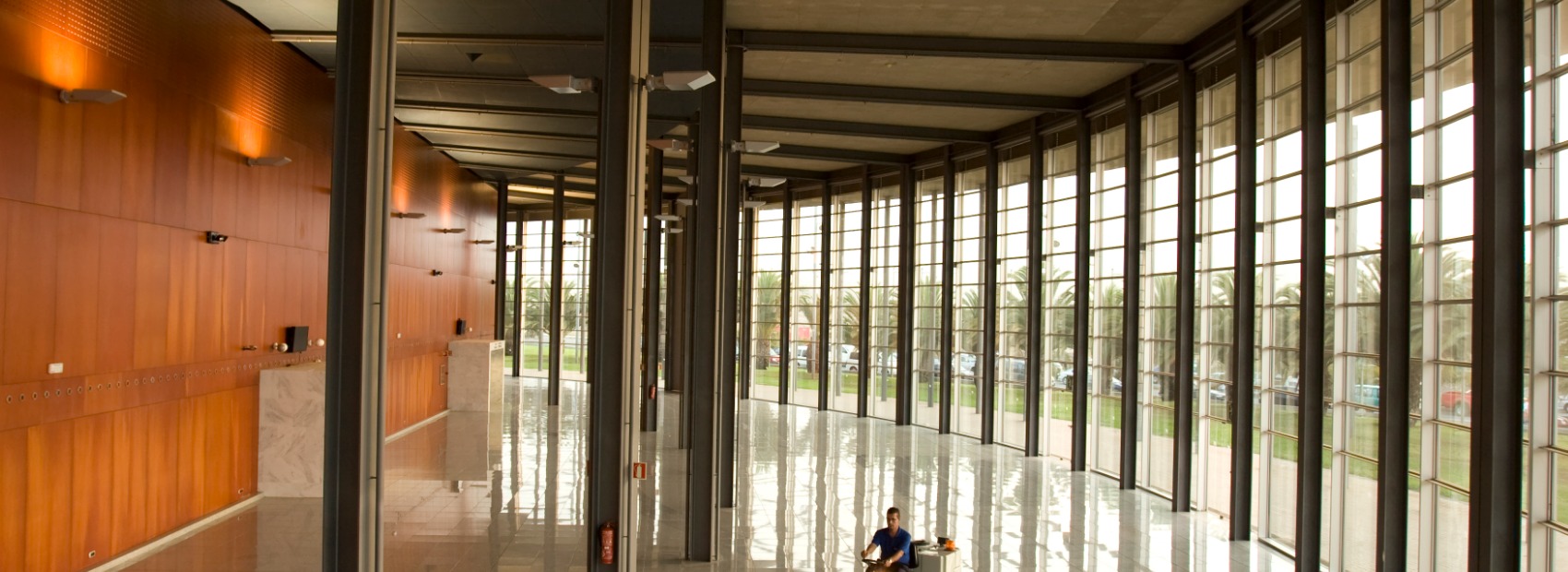 A large lobby with huge interior windows requiring window cleaning from All Window Cleaning Services